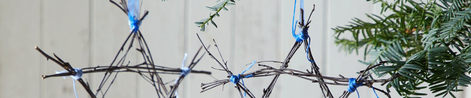 hanukkah garland holiday star with sticks and string